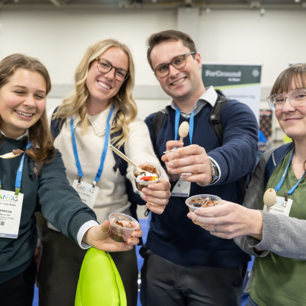 group of smiling attendees facing camera