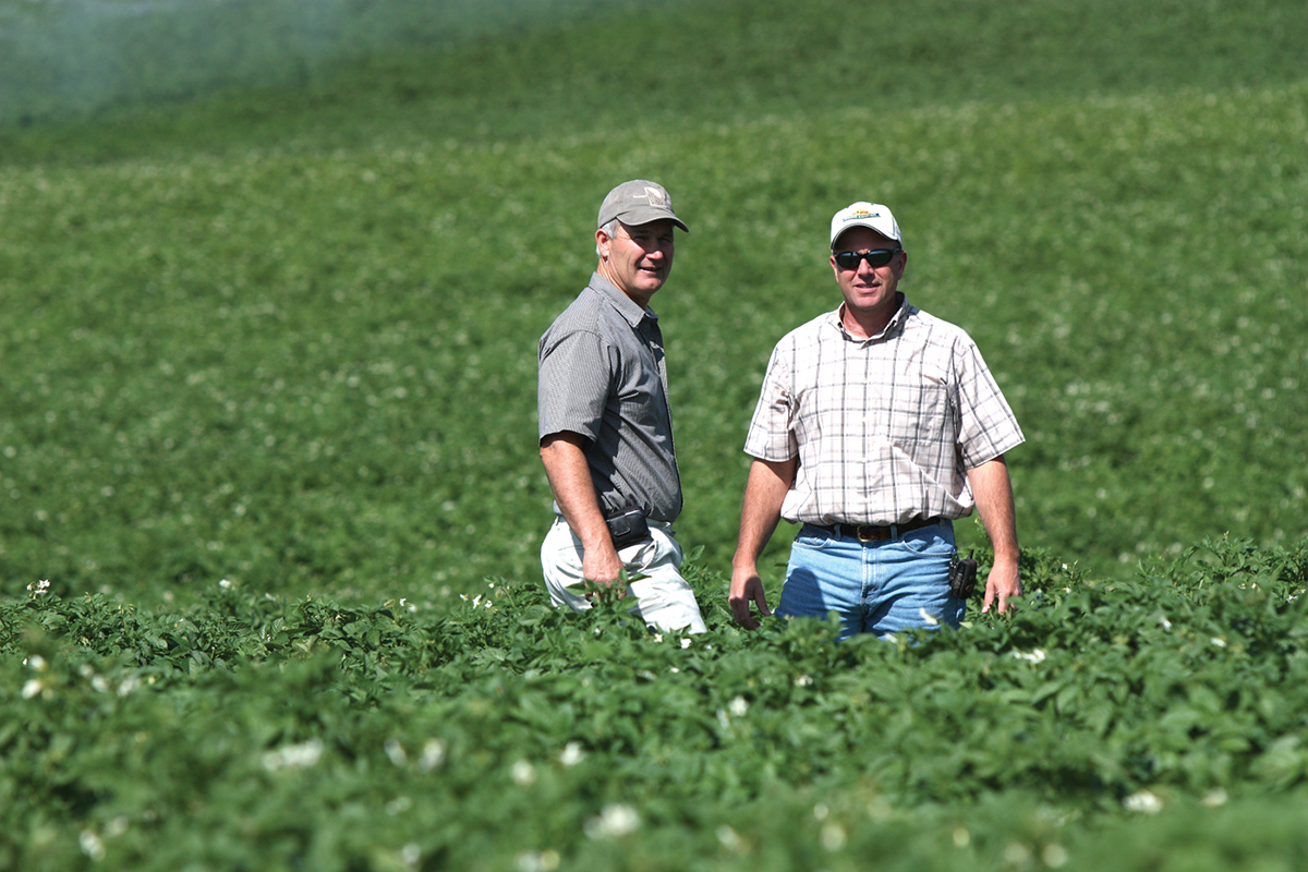 Community-based management of herbicide-resistant weeds brings neighbors together to reach a threshold where enough farmers are managing herbicide resistance to minimize local spread. Photo by Terry Tindall.