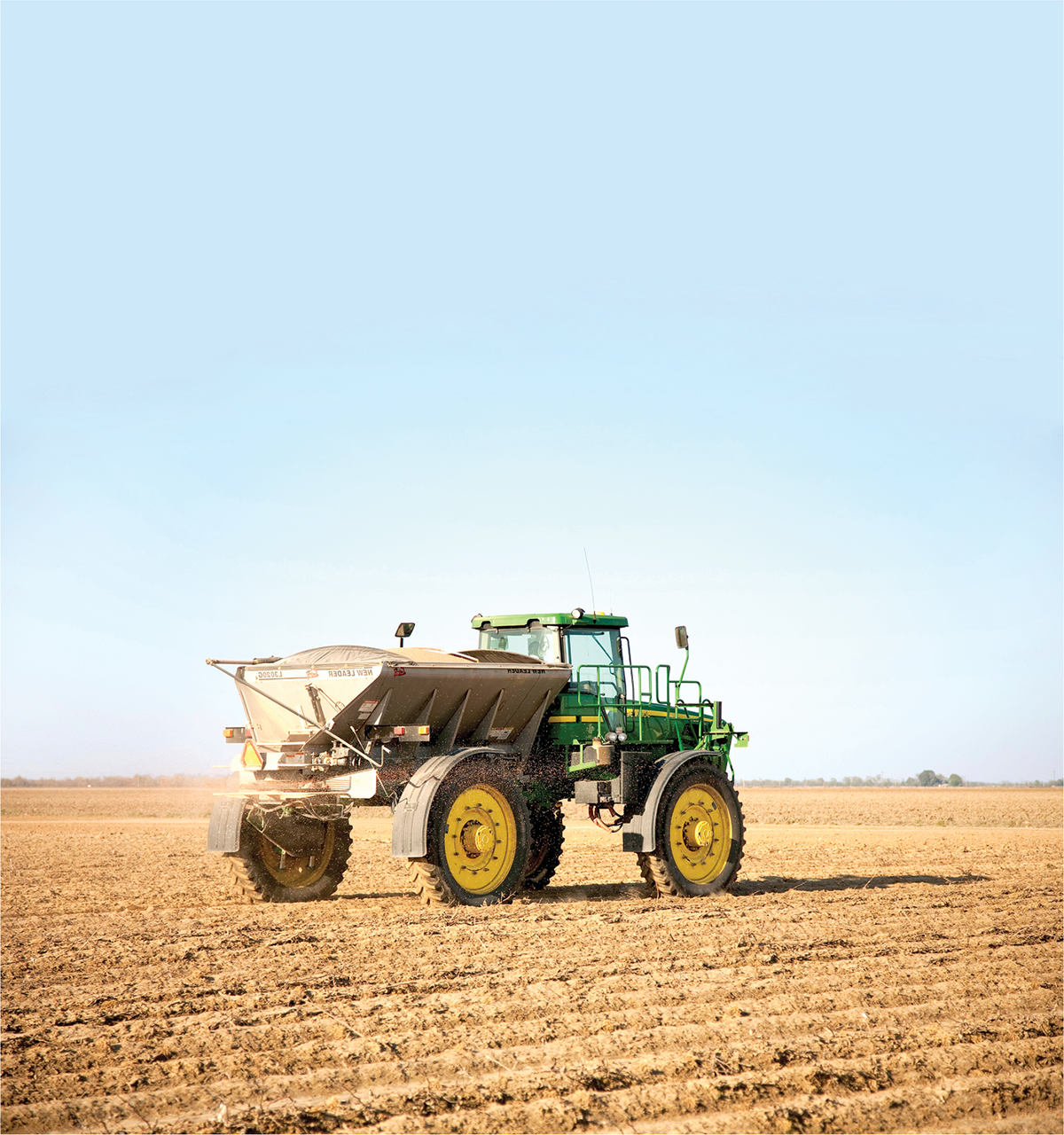 Applying potassium to a field. Source: Design Pics Inc./Alamy Stock Photo.