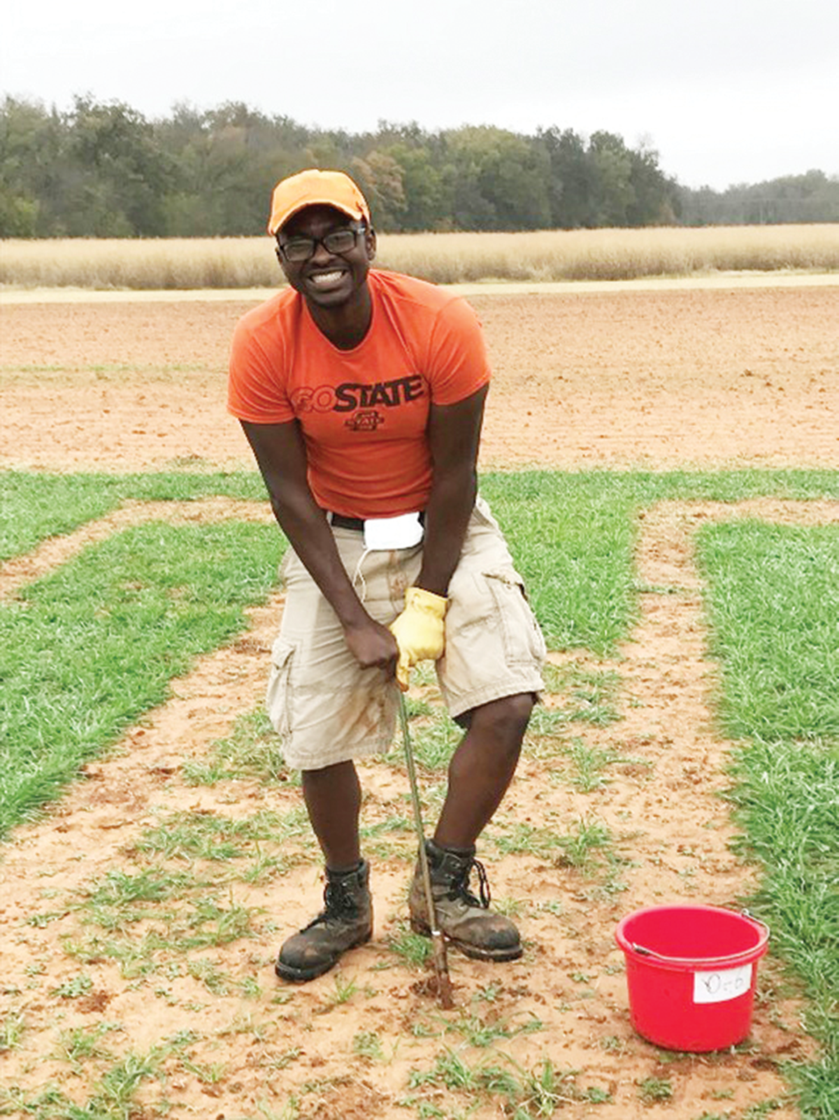 Lead author, Christopher Gillespie, soil sampling a high-acidity plot. Photo by Hailin Zhang.