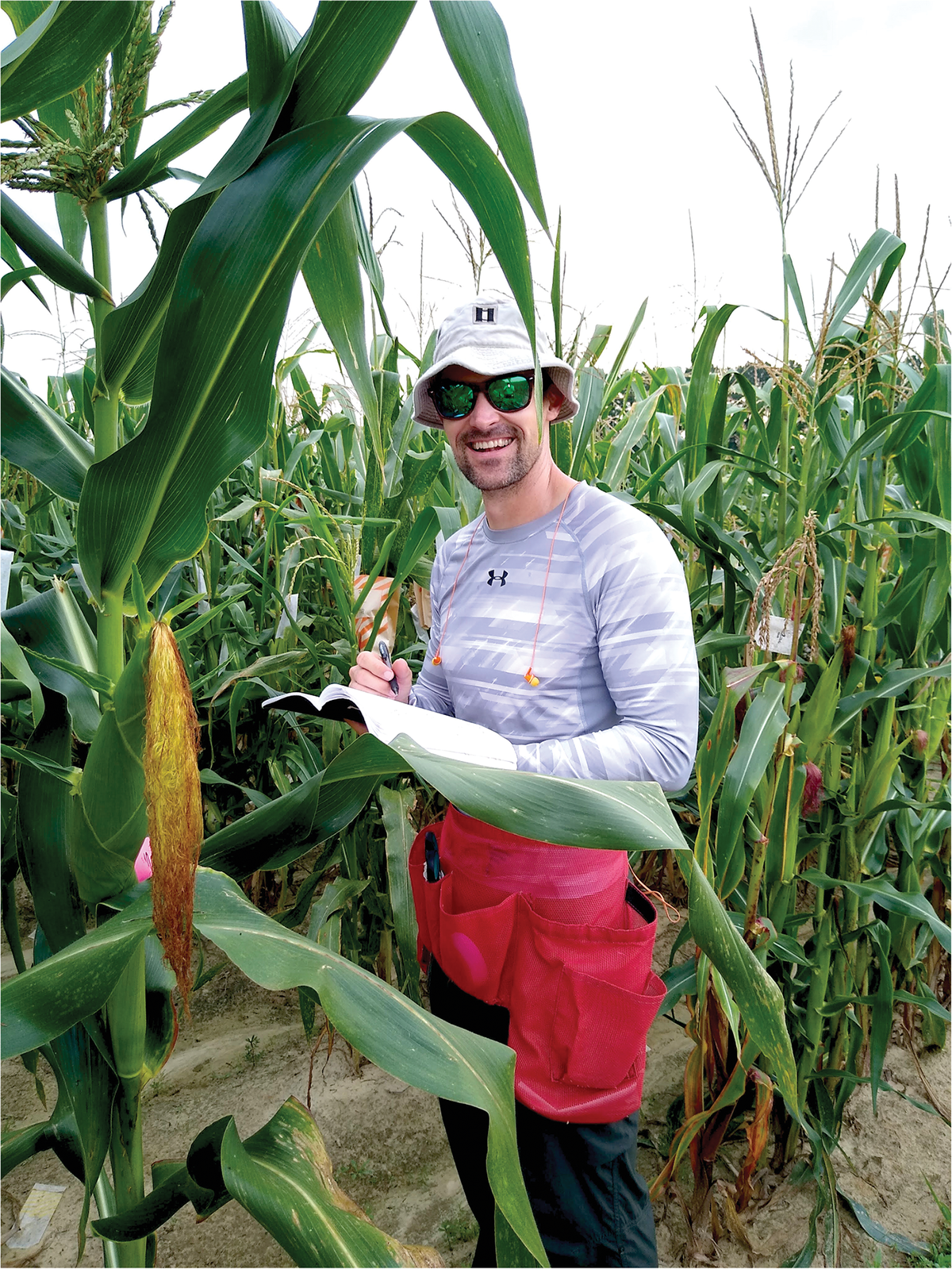 First author Matthew Woore in the field evaluating corn varieties. Photo by Jim Holland.   Volume66, Issue12  December 2021  Page 20  Related Information Recommended Breeding Potential of Intra‐ and Interheterotic Group Crosses in Maize  Rex Bernardo Crop Science Heterosis and Combining Ability of CIMMYT's Quality Protein Maize Germplasm: II. Subtropical  Surinder K. Vasal,  Ganesan Srinivasan,  F.C. González,  David L. Beck,  José Crossa Crop Science Genetic Variation within Maize Breeding Populations  M. 