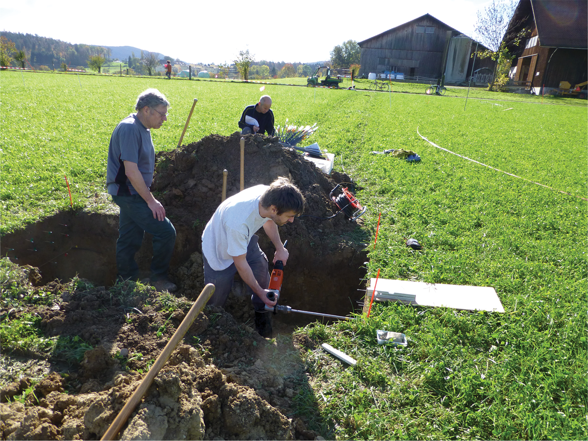 Preparation for installation of soil-embedded sensors used for continuous in situ measurements of state variables. Photo courtesy of Agroscope.