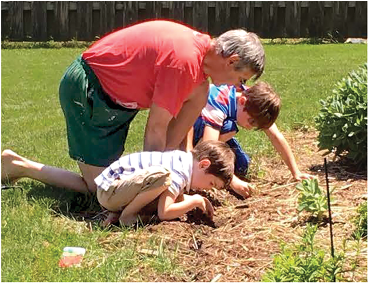 When one retires from full-time employment, the flexibility to contribute more to family support (parents and grandchildren) and fun time, hobbies, travel, etc. is appreciated and important. Here, Paul Carter shows his grandsons how to sow flower seeds in garden borders.