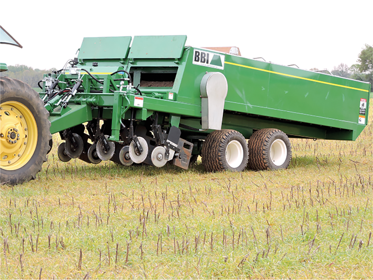 USDA-ARS Subsurfer banding poultry litter in conservation tillage systems while planting soybean into corn stubble. Photo by Dr. Amanda Ashworth.