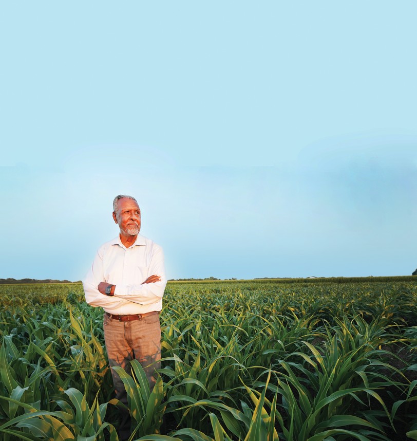 Gebisa Ejeta stands in a sorghum field. Source: Purdue University Agricultural Communications photo/Thomas Campbell.