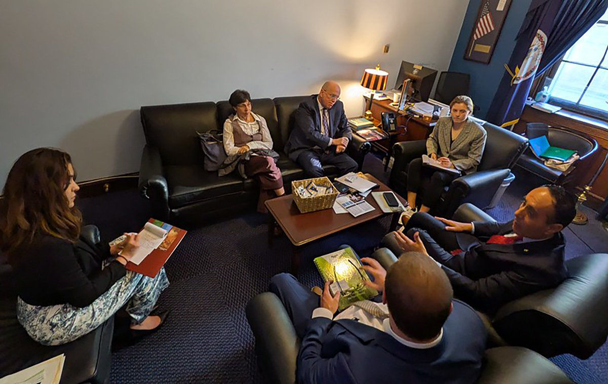 A team of Congressional Visits Day participants meets with a staff member from the office of U.S. Rep. Eugene Vindman