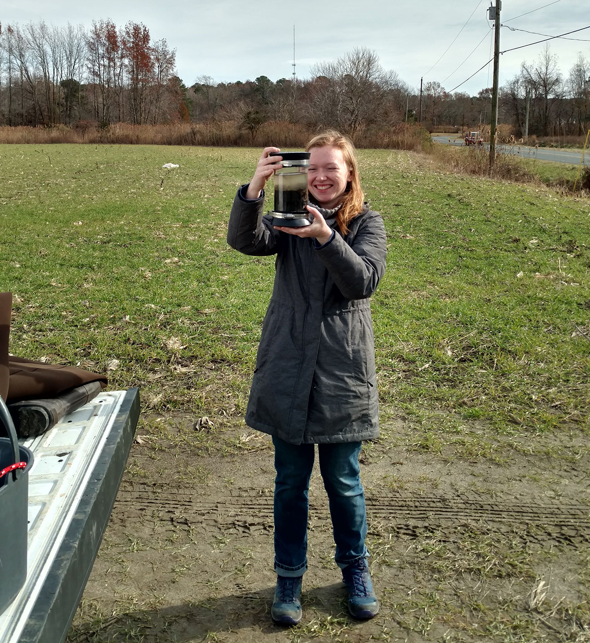 Jessica M. Anton, first author of the study, collecting sediment for isotope analyses. Photo courtesy of Deb Jaisi, University of Delaware.