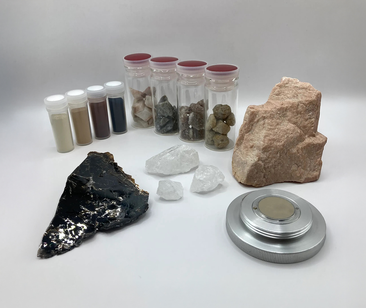 Mineral samples used as standards for fitting of X-ray powder diffraction (XRPD) data, including biotite (trioctahedral mica; black platy mineral at lower left). Details of the method are described in Kurokawa et al. (2025). Photo courtesy of Kohei Kurokawa, Kyoto Prefectural University.