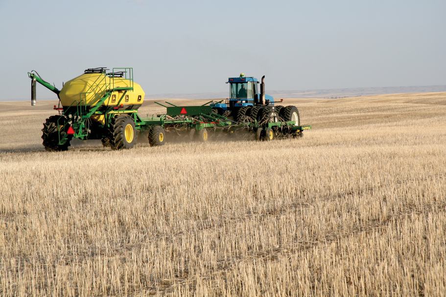 Agricultural systems in western Canada are currently dominated by no-till dryland pro- duction of spring cereal, oilseed, and pulse crops with most nitrogen fertilizer banded at  the time of planting as shown here.