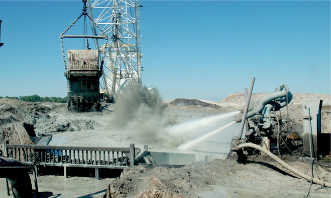 Phosphate ore is converted to a slurry with high-pressure water  cannons and pumped to a plant for refining and fertilizer produc- tion. Photo courtesy of Alan Blaylock.