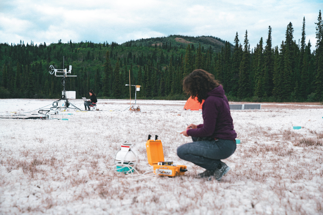 Researchers measure CO2 fluxes and other data at the hydromag- nesite-magnesite playa near Atlin, BC. Photo courtesy of Andrew Mattock