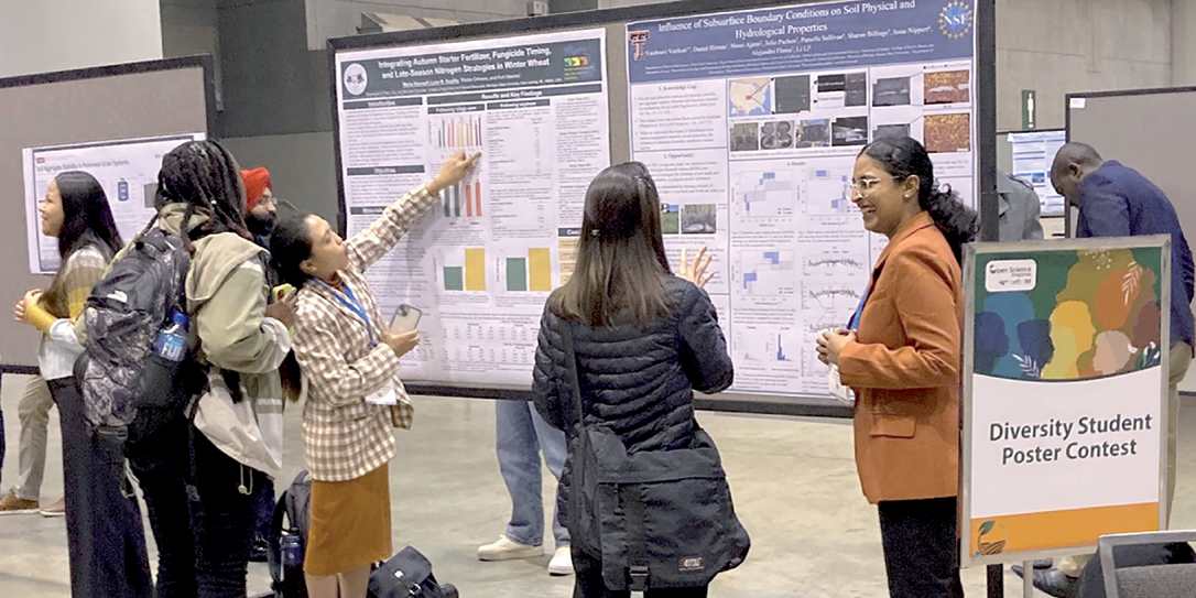 Diversity Student Poster Contest finalist Vaishnavi Varikuti presents a poster.