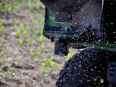 The Environmental Quality Incentives Program (EQIP) will pay growers for up to five years to experiment with cover crops to determine the best seed, management, and termination options for their farm. Here cover crops are being interseeded into corn. Photo by Lynn Betts (NRCS/SWCS).