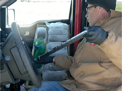 Figure 1, Hydraulic probe in truck cab to sample soil to 24 inches.