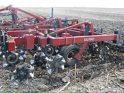 Salford vertical tillage unit with individually mounted wavy coulters. Photo by Jodi DeJong-Hughes, University of Minnesota.