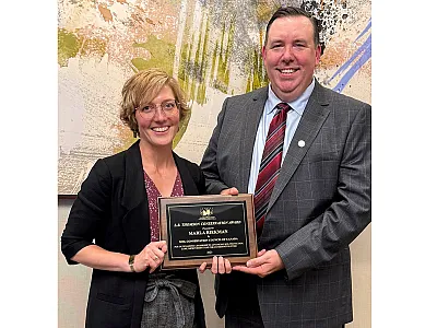 Alan Kruszel, CCA and Eastern Producer Director with the Soil Conservation Council of Canada, presents CCA Marla Riekman with the L.B. Thomson Conservation Award during the Soils for Our Future conference in Winnipeg, MB, Canada, July 20–25, 2025. Riekman is a Soil Management Specialist with Manitoba Agriculture’s Ag Resource Branch.