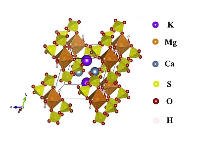 Polyhalite is a naturally occurring evaporite mineral composed of potassium (K), calcium (Ca), magnesium (Mg), and sulfur (S) in sulfate form [K₂Ca₂Mg(SO₄)₄·2H₂O].