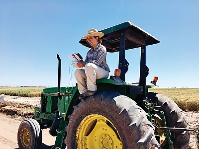 Author Margaret Krause operates an unmanned aerial vehicle at the International Maize and Wheat Improvement Center (CIMMYT) in Ciudad Obregón, Mexico. Photo by José Manuel Reyes Mendoza.