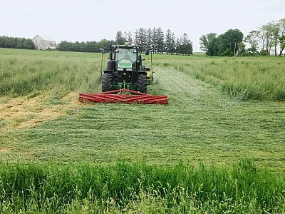Rolling-crimping rye cover crop and planting soybean in a one-pass operation. Photo courtesy of Erin Silva, University of Wisconsin–Madison.