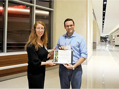 Alex Zilli accepts the 2019 Crop Science Outstanding Paper Award for CSSA Division C8 (Plant Genetic Resources) from managing editor Liz Gebhardt during the Publications Reception at last year’s Annual Meeting in San Antonio, TX. He was the lead author on the paper titled “Widening the Gene Pool of Sexual Tetraploid Bahiagrass: Generation and Reproductive Characterization of a Sexual Synthetic Tetraploid Population” (see https://doi.org/10.2135/cropsci2017.07.0457).