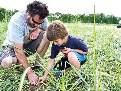 A recent commentary in Agricultural & Environmental Letters argues for a future of farming based on agroecological principles. This farmer has adopted more ecologically relevant farming practices, and his son will now know much more of what to expect in the future. Photo by Alan Franzluebbers.