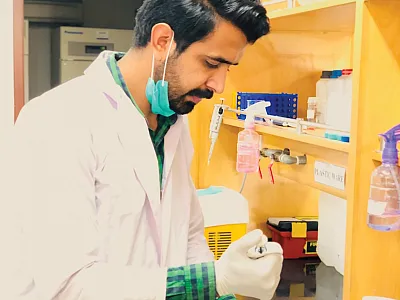 Usman Zulfiqar, Ph.D. student and lead author of the study, working on digestion of rice grain samples for determination of grain Zn concentration. Photo by Aqib Hussain.