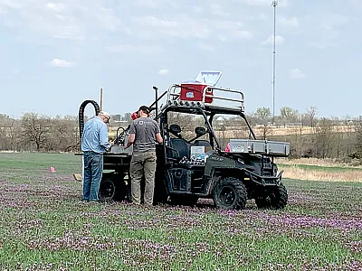 Co-authors Newell Kitchen, a soil scientist with USDA-ARS (left), and Jeffrey Svedin, an agronomist with AgriNorthWest and lead author on the study, collect soil samples from a cornfield in central Missouri. Photo by Matthew Henry.