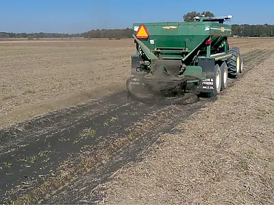 Heat-dried pelleted biosolid applications used as an organic fertilizer for crop production and improving soil health. Photo by Ardeshir Adeli.