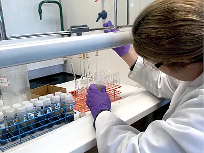 Lead author Jennifer Cooper extracting fatty acids for methyl esters for microbial fingerprinting. Photo by Ryley Thomas.