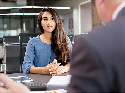 Women may face biases during job interviews with some employers doubting their physical strength or commitment if they’re in their childbearing years or have family responsibilities. Photo courtesy of Adobe Stock/Mangostar.