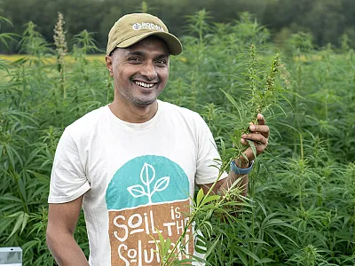 Dinesh Panday, soil scientist with the Rodale Institute, with fiber hemp. 