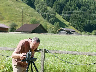 Ryan Stewart using thermal imaging to understand how critical vadose zone properties affect plant heat stress. Photo courtesy of Georg Leitinger.