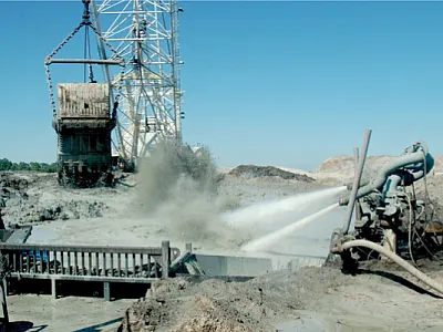 Phosphate ore is converted to a slurry with high-pressure water cannons and pumped to a plant for refining and fertilizer produc- tion. Photo courtesy of Alan Blaylock.