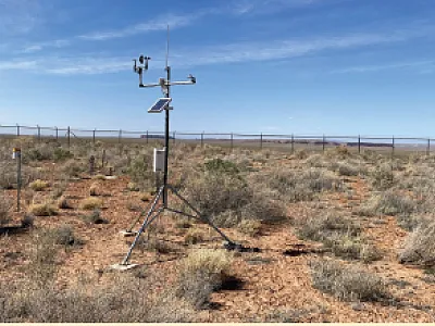 An evapotranspiration cover over uranium mill tailings near Red Mesa, AZ. The cover was constructed in 2012 and is managed by the Navajo Nation Abandoned Mine Lands Reclamation Department. Photo by Steven Bacon.