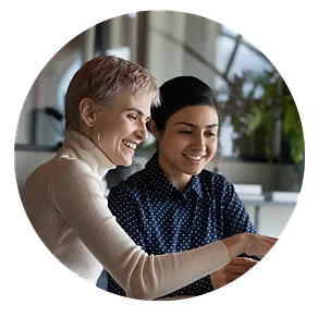 Two women working together