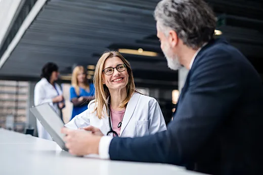 scientist meets with person