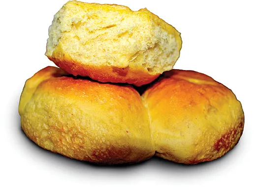 Baking bread with a blend of wheat flour and orange-fleshed sweet potato (OFSP) produces a beautiful and tasty golden product that provides essential vitamin A for consumers. Photo by Duwame Bakery/Frezer Asfaw.